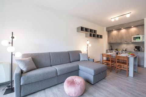 Standard Apartment, 1 Bedroom, Lakeside (Porto Letizia P16) | Living area | 21-inch TV with satellite channels