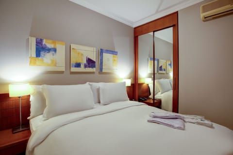 Comfort Room | In-room safe, blackout drapes, free WiFi, bed sheets