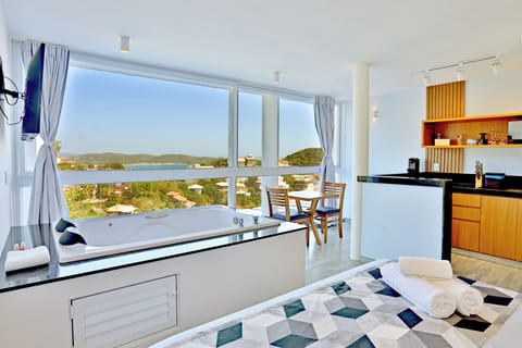 Superior Apartment, 1 Queen Bed, Bathtub, Sea View | Minibar, in-room safe, individually decorated, individually furnished