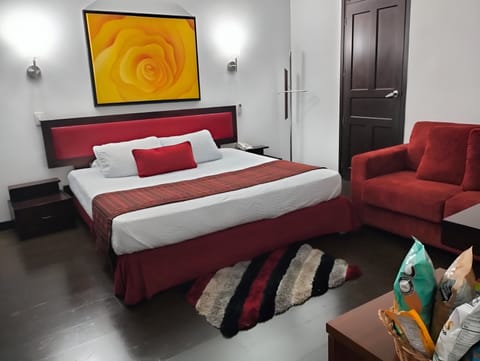 Family Room, 1 Bedroom, Balcony | In-room safe, desk, iron/ironing board, free WiFi