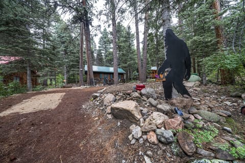 Big Foot waiting to welcome you at the front of the cabin 