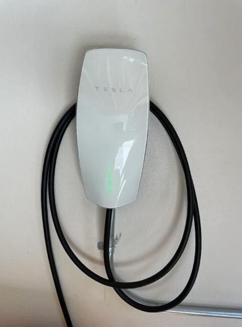 Level 2 Tesla charging included (36 miles per hour)