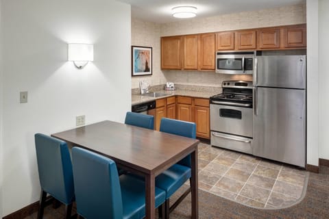 Suite, 2 Bedrooms | Private kitchen | Full-size fridge, microwave, stovetop, dishwasher