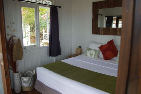 Deluxe Bungalow Partial Ocean View | Premium bedding, pillowtop beds, individually furnished, free WiFi