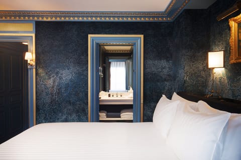 Deluxe Room (Marcel Proust DeLuxe Room) | Premium bedding, minibar, in-room safe, individually decorated