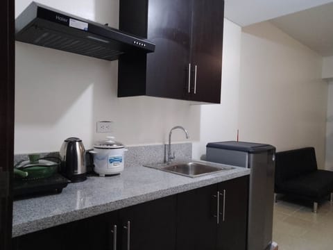 Exclusive Condo, 2 Bedrooms, Private Bathroom, Pool View | Private kitchen | Stovetop, rice cooker, cookware/dishes/utensils, cleaning supplies