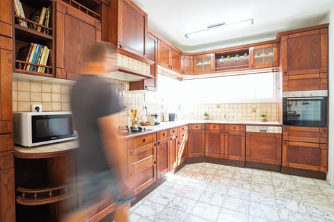 Apartment | Private kitchen | Full-size fridge, microwave, oven, stovetop