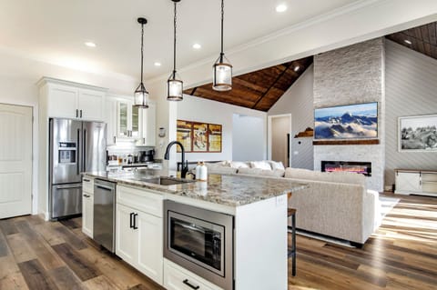 Enjoy our spacious kitchen and gathering area with an 85-inch TV. Cook your favorite meals while never missing a moment of your favorite show.