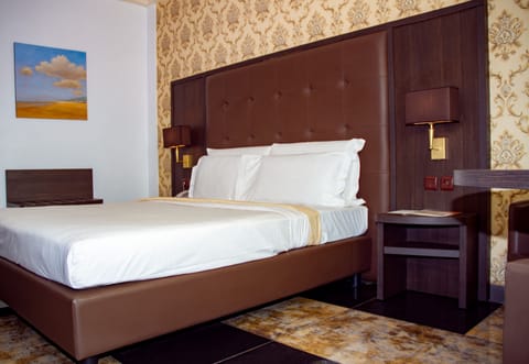 Comfort Room | Pillowtop beds, in-room safe, individually decorated