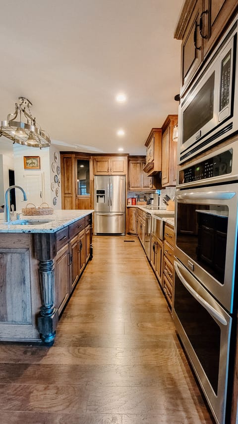 Kitchen with double convection ovens, island sink, extra large fridge, etc! 