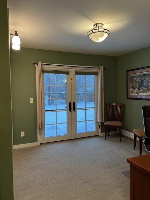 The 3rd bedroom with bed put away in closet, providing extra space for play area