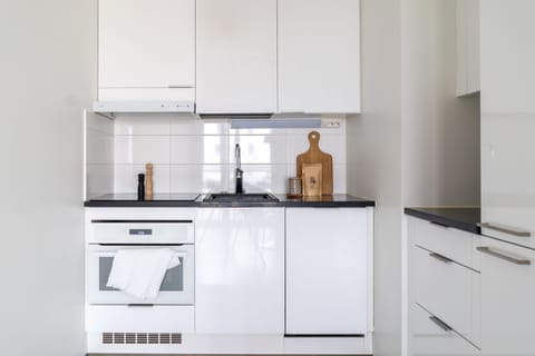 Apartment | Private kitchen | Fridge, oven, stovetop, dishwasher