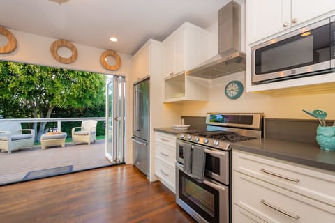Well equipped kitchen with access to backyard.