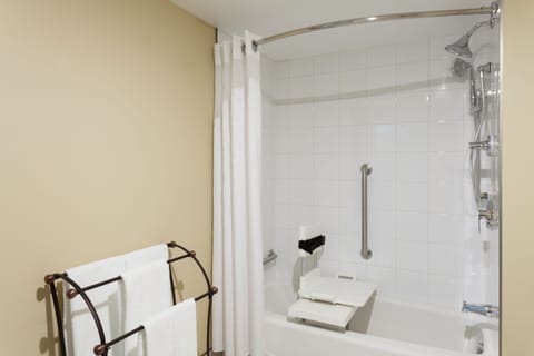 Combined shower/tub, designer toiletries, hair dryer, towels