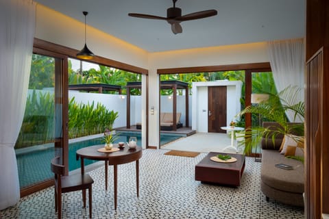 Private Pool Deluxe Villa - 1 Bedroom | Living area | 52-inch Smart TV with digital channels, TV, computer monitors