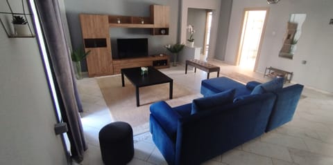 Family Condo | Living area | 50-inch Smart TV with cable channels, Netflix, streaming services