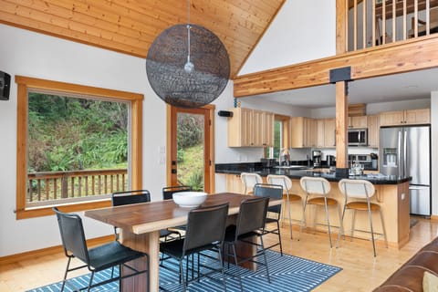 Comfortably seat 10 for dining (6 at the table, 4 at the bar).