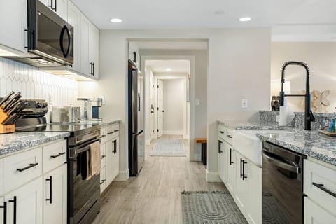 Kitchen is fully appointed and also includes a dishwasher, blender and crock pot.