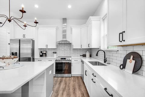 Latitude features a beautiful quartz island seating for grab-and-go meals!