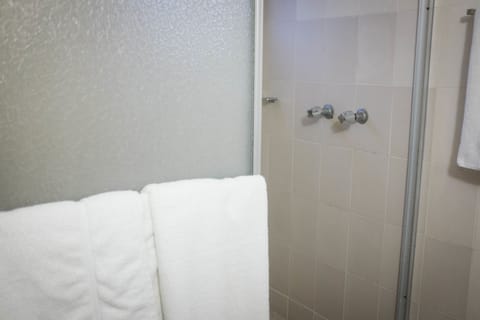 Standard Room, 1 Double Bed | Bathroom | Shower, hair dryer, towels