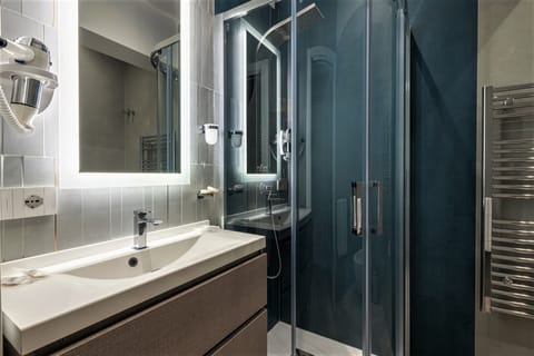 Superior Room | Bathroom | Rainfall showerhead, hair dryer, slippers, bidet