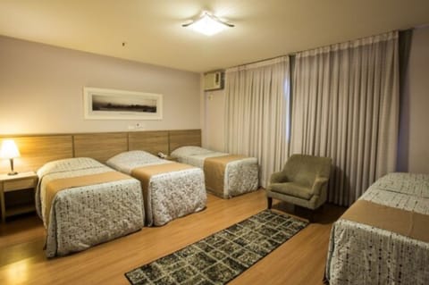 Superior Triple Room | Minibar, laptop workspace, blackout drapes, free cribs/infant beds