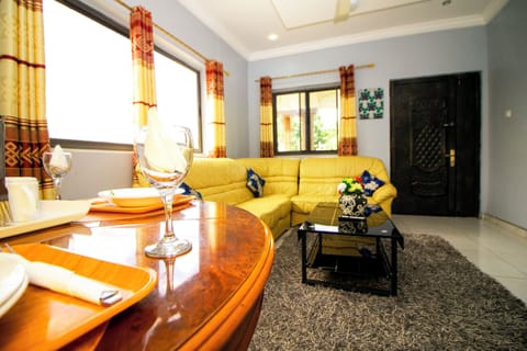 Standard Apartment, 3 Bedrooms, Garden View | Living area | Flat-screen TV