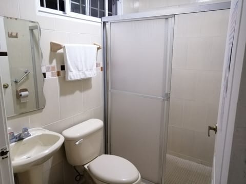 Junior Single Room | Bathroom | Shower, rainfall showerhead, towels