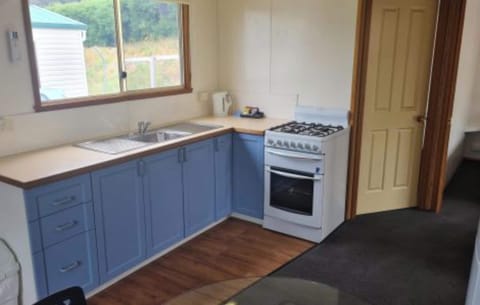 Standard Cabin - Double Sleeps 4 | Private kitchen | Full-size fridge, microwave, stovetop, coffee/tea maker