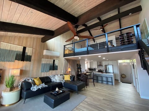 An open floor-plan enables socializing while enjoying a fabulous view.