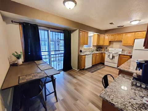 There is also a nice dining area on the edge of the kitchen with a washer and dryer in the enclosed patio through the sliding doors in the kitchen area.
