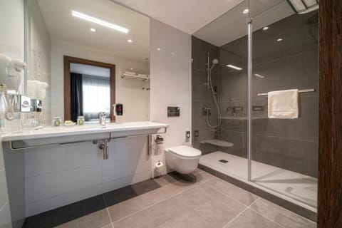 Studio Plus | Bathroom | Free toiletries, hair dryer, slippers, towels