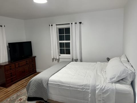 Bedroom 1 with Queen bed and TV with Fire Stick