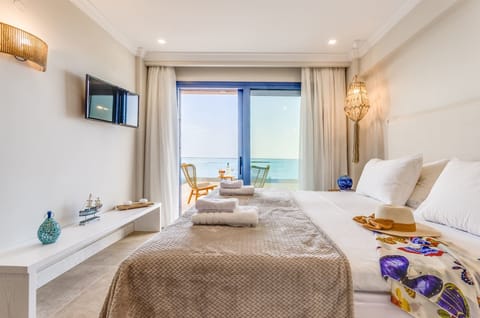 Deluxe Suite, Sea View | Pillowtop beds, in-room safe, individually decorated