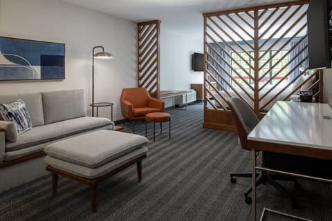 Suite, Multiple Beds | Living room | 50-inch TV with digital channels, Netflix, iPod dock