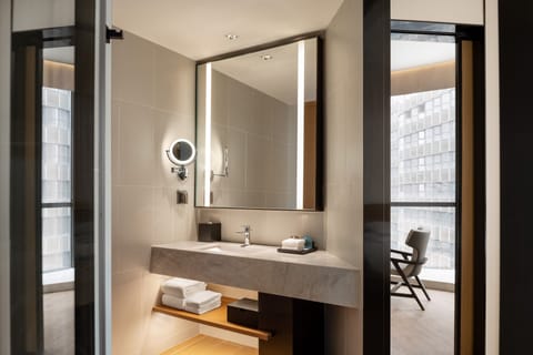 Suite, 1 King Bed | Bathroom | Shower, rainfall showerhead, free toiletries, hair dryer