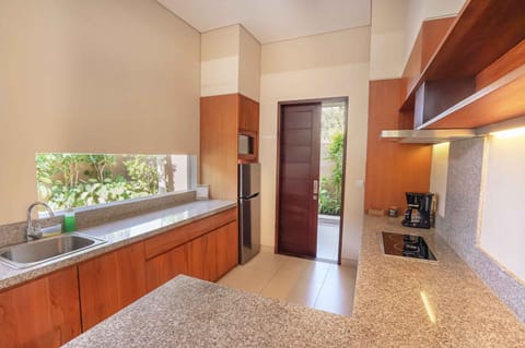 One-bedroom Royal Pool Villa | Private kitchen | Fridge, microwave, stovetop, dishwasher