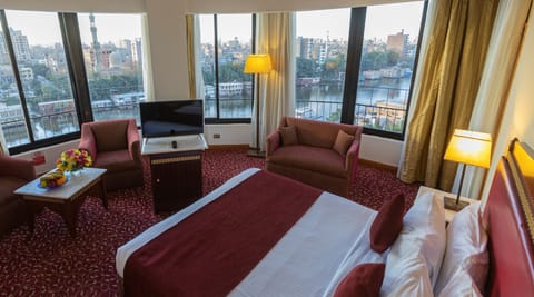 Executive Double Room, River View | Minibar, in-room safe, individually decorated, individually furnished