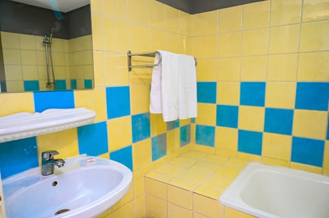 Classic Double Room | Bathroom | Combined shower/tub, spring water tub, towels, soap