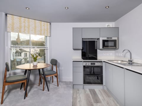 Fridge, dishwasher, electric kettle, toaster