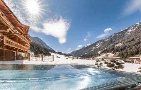 Indoor pool, outdoor pool, pool umbrellas