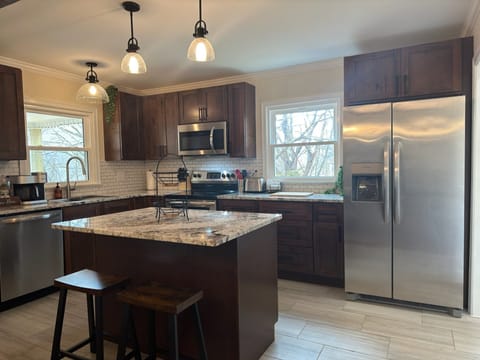 Lovely, remodeled kitchen with new granite countertops and custom cabinets!