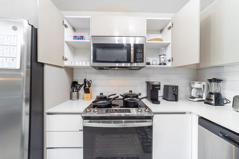 Superior Loft | Private kitchen | Full-size fridge, microwave, oven, stovetop