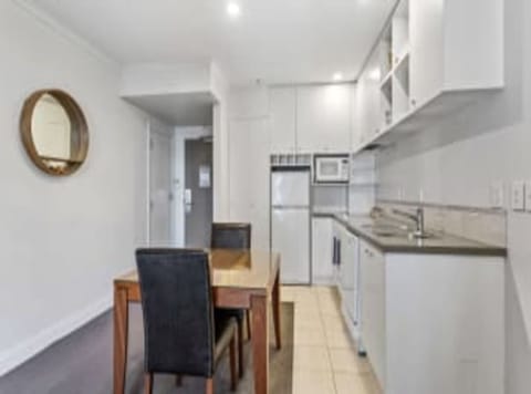 Apartment | Private kitchen | Fridge, microwave, stovetop, cookware/dishes/utensils