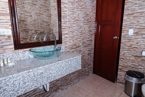 Family Room | Bathroom | Rainfall showerhead, free toiletries, heated floors, towels