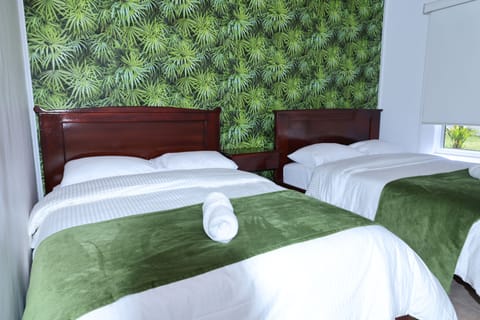 Twin Room, Courtyard View | Hypo-allergenic bedding, down comforters, Select Comfort beds