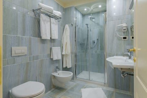 Standard Room | Bathroom | Shower, rainfall showerhead, hair dryer, bathrobes