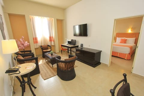 Family Room, Multiple Beds, Non Smoking, City View | Living area | 32-inch TV with satellite channels