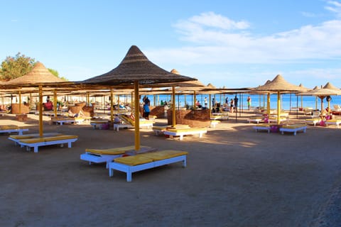 Private beach, sun loungers, beach umbrellas, beach volleyball