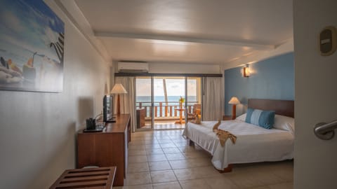 Beachfront Room, 1 King Bed | Premium bedding, down comforters, minibar, in-room safe